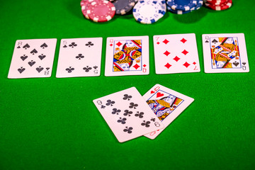 Three of a kind winning hand in a game of Texas Holdem poker;