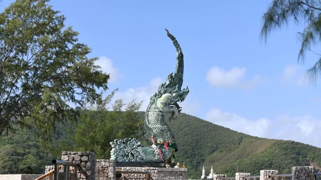 Naga sculptures spraying water A symbol of Songkhla Province, Thailand The floating Spraying water into the estuary lake is popular with tourists, Songkhla Province,Thailand February &lrm;24, &lrm;2020