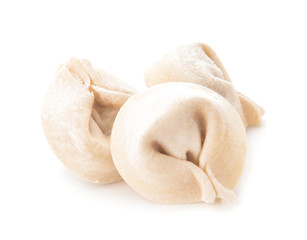 Raw fresh dumplings on white background