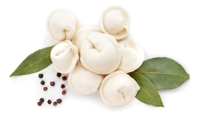 Raw fresh dumplings on white background
