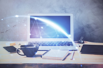 Computer on desktop with social network hologram. Multi exposure. Concept of international people...