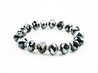 Woman bracelet made of stones on white background
