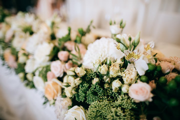  Wedding decor. Bouquet of fresh flowers on dinner table