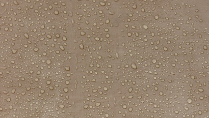 Raindrops on a tent as an abstract background