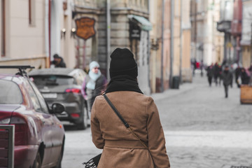 young pretty woman portrait city street on background