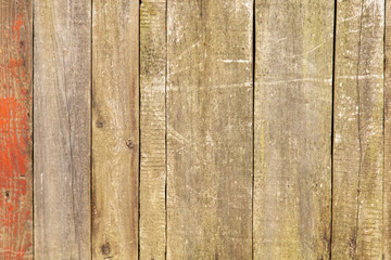 Old wooden boards on the fence as a background