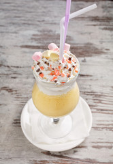 Delicious dessert. Ice cream in a glass with a rubbish and marshmallows. Dessert at the restaurant.