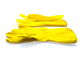 Rubber gloves for cleaning isolated on a white background. Yellow gloves to protect hands. Gloves for cleaning.