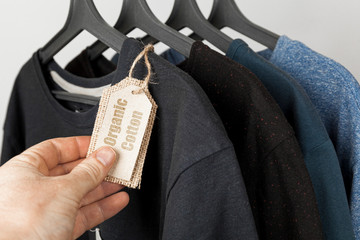 Organic cotton t-shirt clothing with label. Eco textile.