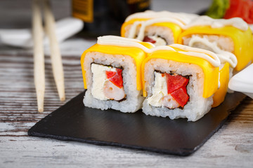 Tasty sushi set. Japanese traditional dishes. Rice rolls. Close up.