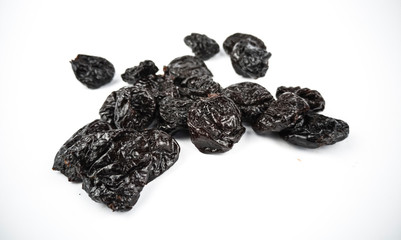 Prunes isolated on a white background