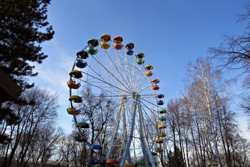 Empty Ferris wheel in a city Park