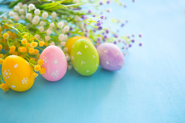 Easter eggs decoration on a wooden table.