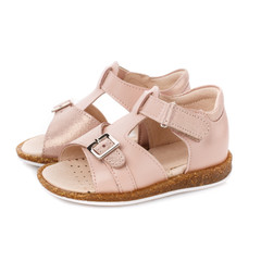 Beige sandals for girls isolated on white. Side view