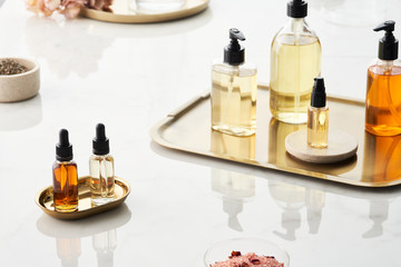 Skincare cosmetics in bottles and dispensers