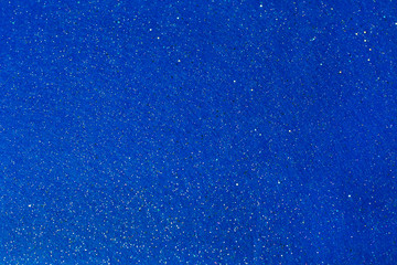 Obraz premium Shiny bright blue sky brilliant paper glitter background.
