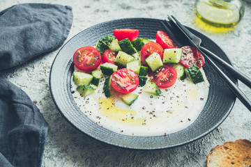 Fresh salad with cucumbers and tomatoes
