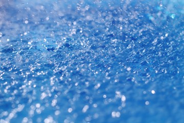 Obraz premium water drops on blue surface