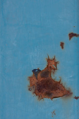 Abstract background peeling and cracked paint of an old rusty train wagon. Metal rust texture....