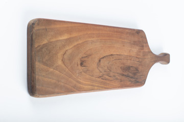 A narrow long cutting board. angle view