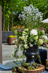 Flower arrangement in vase at wedding party
