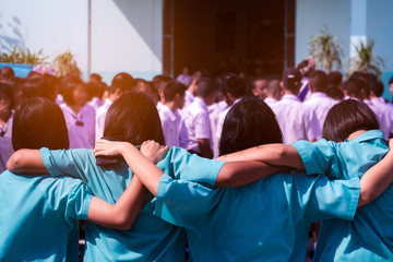 Asian uniform students hugging with love,Concept of best friends