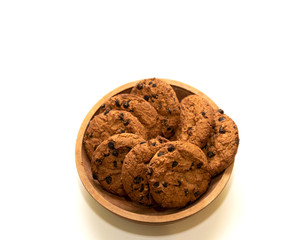oatmeal cookies with pieces of chocolate on a white background