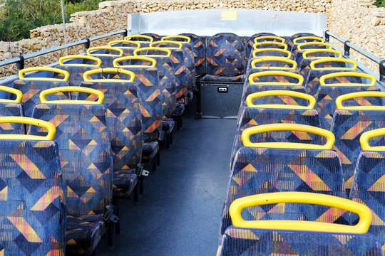 Passenger Seats On The Top Deck Of A Double Decker Bus