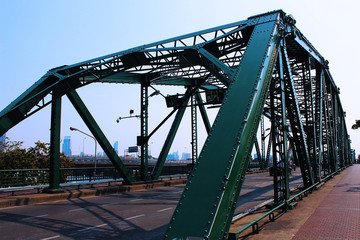 The green iron bridge over the Chao Phraya River in Bangkok