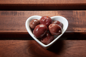 dark olives in spicy brine