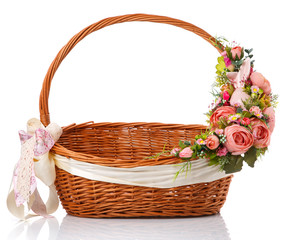 Fototapeta na wymiar Basket decorated handmade. Festive basket decorated with flowers on white background.