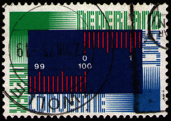 NETHERLANDS - CIRCA 1975: Postage stamp 50 dutch cents printed in the Netherlands (Holland), shows International Metre Convention symbol, circa 1975