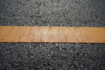 Fototapeta premium Yellow traffic on the road surface in Thailand