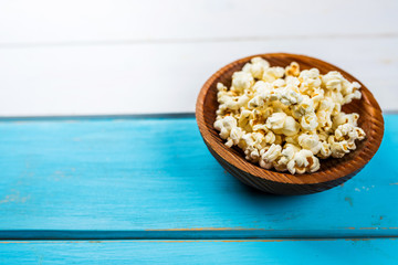 Popcorn in wood dish