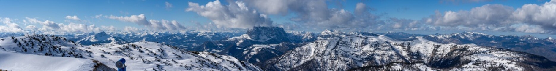 panorama photography, beautiful panoramic view over the Austrian Alps to the Wilder Kaiser mountain, blue sky with some clouds