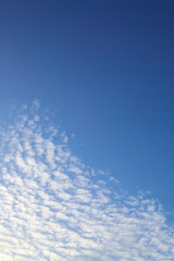 Naklejka na ściany i meble sunlight shiny through white cloud on blue sky background