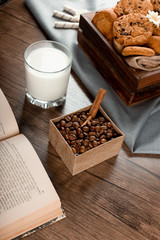 Cookie tray, glass of milk and coffee beans
