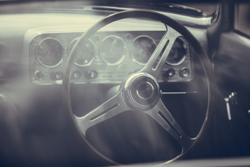 Wooden steering wheel of an old classic car