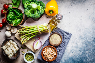 Cooking healthy vegan food. Ingredients for vegetable salad with tofu and quinoa.