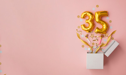 Number 35 birthday balloon celebration gift box lay flat explosion - obrazy, fototapety, plakaty