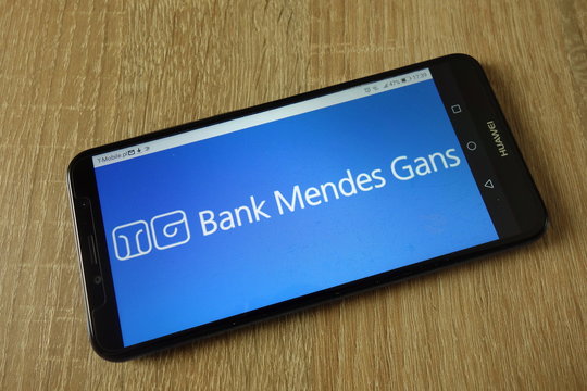 KONSKIE, POLAND - March 11, 2019: Bank Mendes Gans (BMG) logo displayed on smartphone