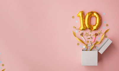 Number 10 birthday balloon celebration gift box lay flat explosion - obrazy, fototapety, plakaty