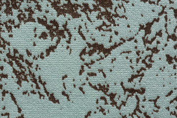 Extravagant mottled fabric texture in light tone.