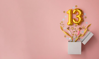 Number 13 birthday balloon celebration gift box lay flat explosion - obrazy, fototapety, plakaty
