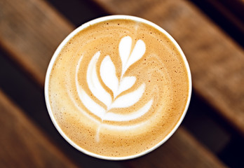coffee foam in a disposable cup