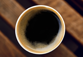 coffee foam in a disposable cup - 325676106