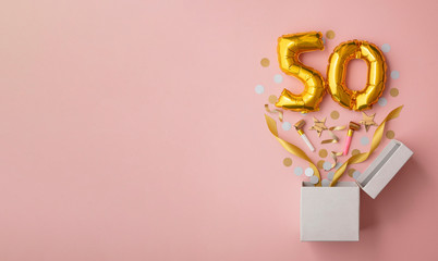 Number 50 birthday balloon celebration gift box lay flat explosion - obrazy, fototapety, plakaty