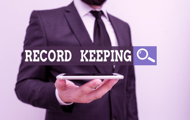 Conceptual hand writing showing Record Keeping. Concept meaning The activity or occupation of...