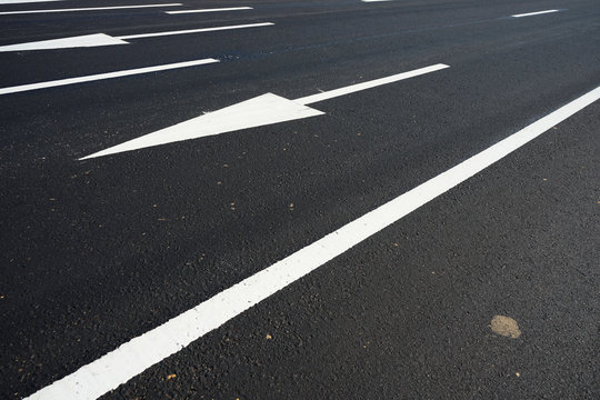 Arrows on asphalt roads and traffic lines in Thailand