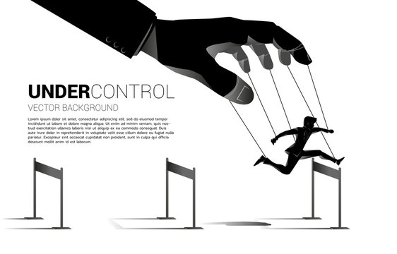 Puppet Master controlling Silhouette of businessman run and jumping across hurdles obstacle. Concept of manipulation and micromanagement